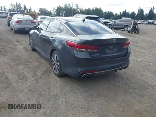 2016 Kia Optima SX Turbo z VIN 5XXGW4L28GG010897, wystawiony jako IAAI lot #42703779 z przebiegiem 121 918 mil mil oraz . Historia ofert i sprzedaży dostępna na DreamBid. Obrazek 3.