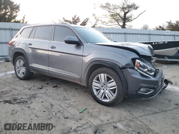 2019 Volkswagen Atlas SEL with VIN 1V2MR2CA5KC611651, listed as a Copart auction lot 86368654 with 54,066 mi miles and Salvage title. Bid and sale history available at DreamBid. Image 4.