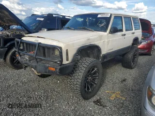 1999 Jeep Cherokee SE with VIN 1J4FF28S2XL573480, listed as a Copart auction lot 74899484 with Not provided miles and Salvage title. Bid and sale history available at DreamBid. Image 1.