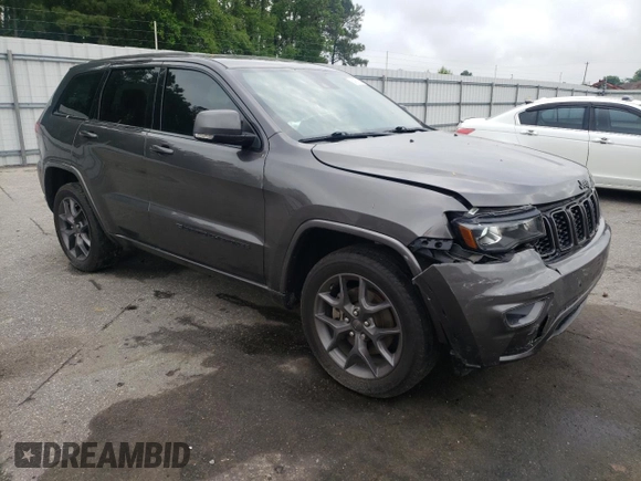 2021 Jeep Grand Cherokee 80th Anniversary z VIN 1C4RJEBG7MC679667, wystawiony jako Copart lot #54167225 z przebiegiem 77 268 mil mil oraz Szkoda całkowita • Salvage title. Historia ofert i sprzedaży dostępna na DreamBid. Obrazek 4.