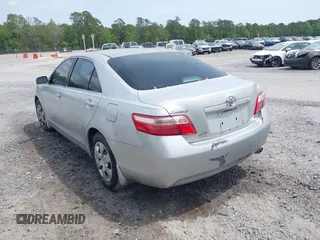 2007 Toyota Camry CE with VIN 4T1BE46KX7U074048, listed as a IAAI auction lot 42101519 with 214,034 mi miles and . Bid and sale history available at DreamBid. Image 3.