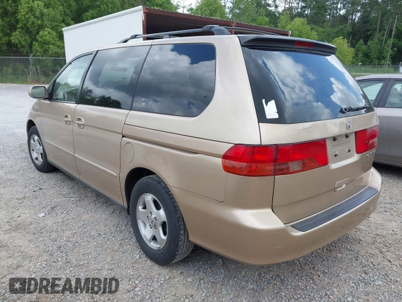 2001 Honda Odyssey EX z VIN 2HKRL18631H601677, wystawiony jako IAAI lot #42270829 z przebiegiem 205 706 mil mil oraz . Historia ofert i sprzedaży dostępna na DreamBid. Obrazek 3.