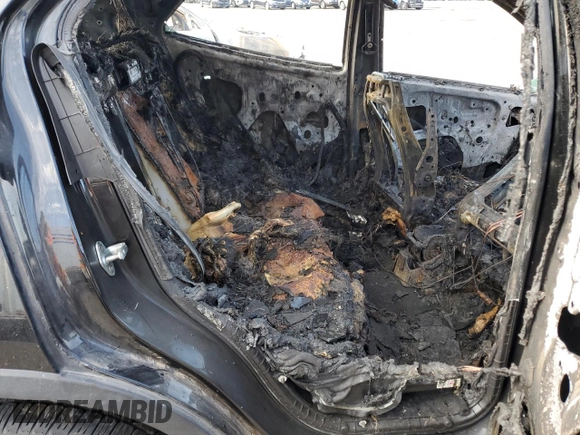 2020 Buick Encore Essence z VIN KL4CJGSB7LB048177, wystawiony jako Copart lot #89152405 z przebiegiem Nie podano mil oraz Nie do naprawy. Historia ofert i sprzedaży dostępna na DreamBid. Obrazek 10.
