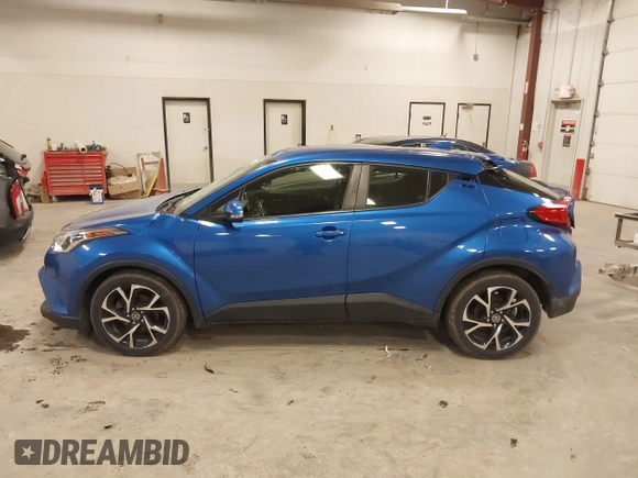 2019 Toyota C-HR XLE with VIN JTNKHMBX0K1042342, listed as a IAAI auction lot 41935879 with 54,190 mi miles and . Bid and sale history available at DreamBid. Image 14.