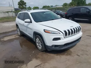 2015 Jeep Cherokee Latitude with VIN 1C4PJLCB9FW730487, listed as a IAAI auction lot 42096313 with 186,592 mi miles. Bid and sale history available at carsss.com. Image 1.