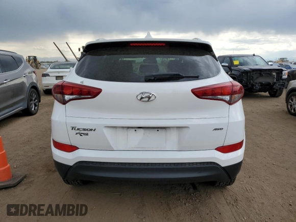 2018 Hyundai Tucson SEL with VIN KM8J3CA4XJU617796, listed as a Copart auction lot 60863885 with 57,995 mi miles and Clean title. Bid and sale history available at DreamBid. Image 6.