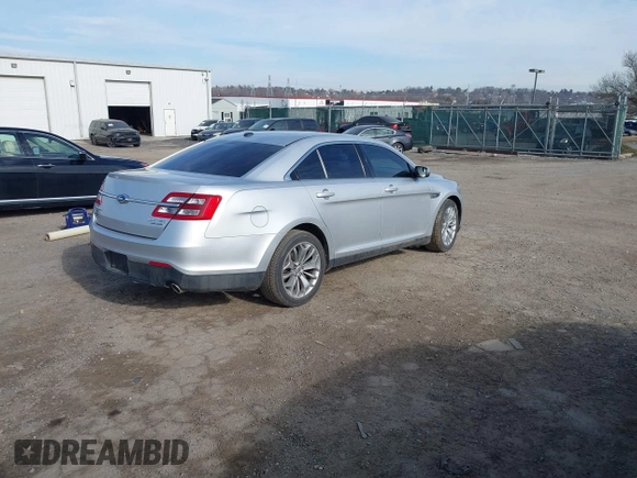 2014 Ford Taurus Limited with VIN 1FAHP2F86EG134779, listed as a IAAI auction lot 41660527 with 115,016 mi miles. Bid and sale history available at carsss.com. Image 4.