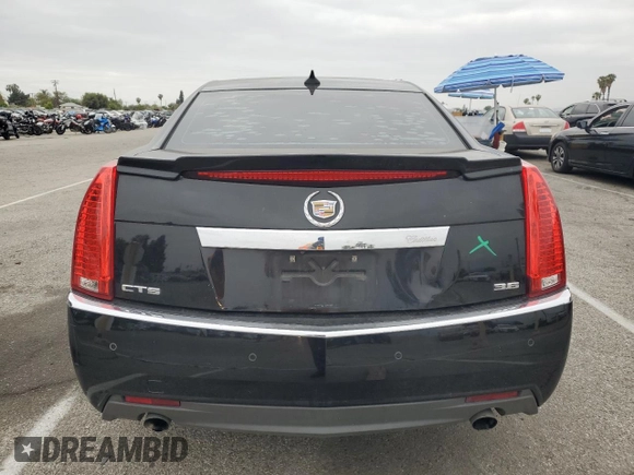 2013 Cadillac CTS Premium с VIN 1G6DP5E38D0107402, выставлен на аукционе Copart как лот 53307855 с пробегом 125 639 миль миль и Списание • Salvage title. История ставок и продаж доступна на DreamBid. Изображение 6.