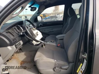 2010 Toyota Tacoma PreRunner with VIN 3TMJU4GN5AM097146, listed as a Copart auction lot 62339915 with 329,044 mi miles and Salvage title. Bid and sale history available at DreamBid. Image 7.