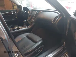 2014 Infiniti Q50 Premium z VIN JN1BV7AR7EM696486, wystawiony jako IAAI lot #41976047 z przebiegiem 145 000 mil mil oraz . Historia ofert i sprzedaży dostępna na DreamBid. Obrazek 5.