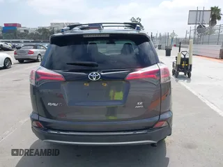 2017 Toyota RAV4 SE with VIN JTMJFREV5HJ155712, listed as a IAAI auction lot 42613998 with 72,112 mi miles and . Bid and sale history available at DreamBid. Image 16.