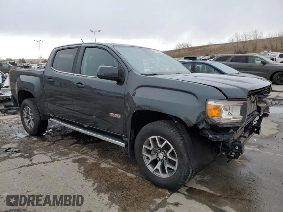 2018 GMC Canyon z VIN 1GTP6CE1XJ1173875, wystawiony jako Copart lot #47258005 z przebiegiem 104 076 mil mil oraz Szkoda całkowita • Salvage title. Historia ofert i sprzedaży dostępna na DreamBid. Obrazek 4.
