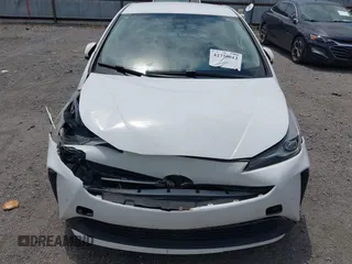 2022 Toyota Prius L Eco with VIN JTDKAMFU2N3181924, listed as a IAAI auction lot 42716012 with 177,658 mi miles and . Bid and sale history available at DreamBid. Image 6.