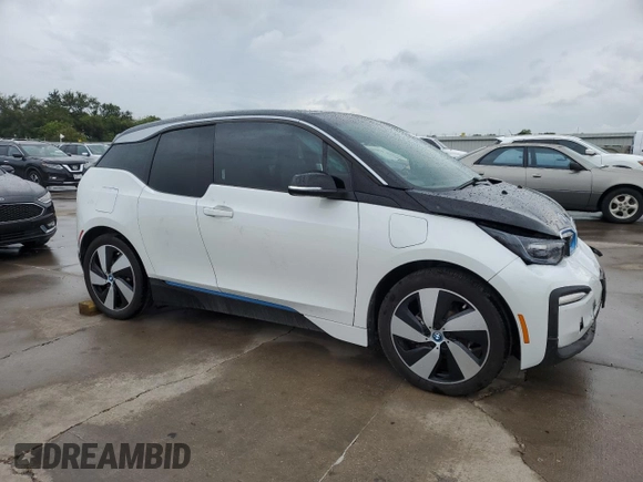 2020 BMW i3 z VIN WBY8P4C06L7G85006, wystawiony jako Copart lot #62149924 z przebiegiem Nie podano mil oraz Szkoda całkowita • Salvage title. Historia ofert i sprzedaży dostępna na DreamBid. Obrazek 4.