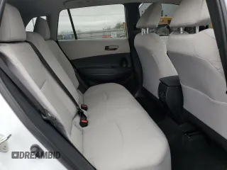 2023 Toyota Corolla Cross LE z VIN 7MUBAAAG5PV037601, wystawiony jako Copart lot #49168915 z przebiegiem 24 175 mil mil oraz Szkoda całkowita • Salvage title. Historia ofert i sprzedaży dostępna na DreamBid. Obrazek 11.