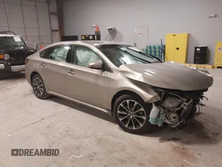 2016 Toyota Avalon Limited z VIN 4T1BK1EB4GU196199, wystawiony jako IAAI lot #41650661 z przebiegiem 119 966 mil mil oraz . Historia ofert i sprzedaży dostępna na DreamBid. Obrazek 1.