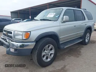 1999 Toyota 4Runner SR5 z VIN JT3GN86R1X0123115, wystawiony jako IAAI lot #41505478 z przebiegiem 173 141 mil mil oraz . Historia ofert i sprzedaży dostępna na DreamBid. Obrazek 18.