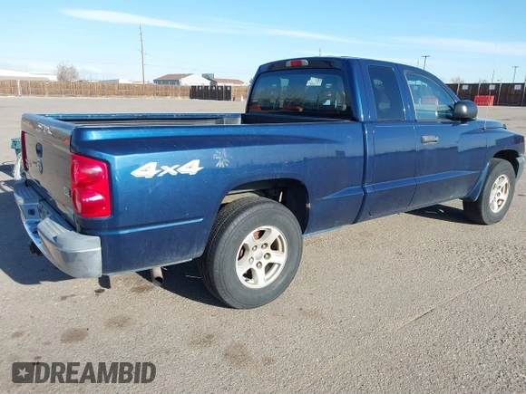 2005 Dodge Dakota SLT with VIN 1D7HW42N15S365967, listed as a IAAI auction lot 41798935 with 220,243 mi miles and . Bid and sale history available at DreamBid. Image 4.