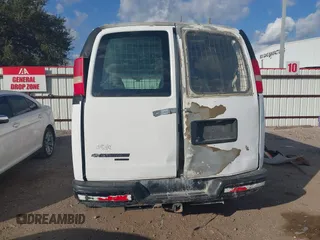 2013 Chevrolet Express Cargo with VIN 1GCWGFBA6D1185850, listed as a IAAI auction lot 40965967 with 165,641 mi miles and . Bid and sale history available at DreamBid. Image 16.