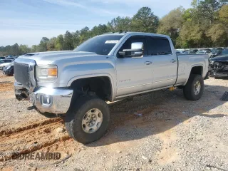 2015 GMC Sierra 2500HD SLT with VIN 1GT12ZE89FF610874, listed as a Copart auction lot 49912725 with 242,442 mi miles and Salvage title. Bid and sale history available at DreamBid. Image 1.
