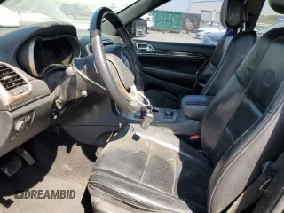 2015 Jeep Grand Cherokee Overland with VIN 1C4RJFCG3FC104439, listed as a Copart auction lot 50780295 with 196,549 mi miles and Salvage Title. Bid and sale history available at carsss.com. Image 7.