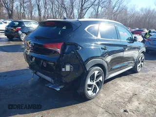 2018 Hyundai Tucson Sport with VIN KM8J33ALXJU771481, listed as a IAAI auction lot 41399335 with 64,905 mi miles. Bid and sale history available at carsss.com. Image 4.