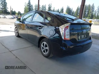 2015 Toyota Prius Four with VIN JTDKN3DU1F1899480, listed as a IAAI auction lot 42127015 with 247,659 mi miles and . Bid and sale history available at DreamBid. Image 3.