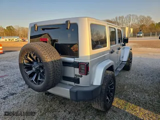 2011 Jeep Wrangler Unlimited Sahara with VIN 1J4BA5H16BL627992, listed as a Copart auction lot 49184625 with 197,845 mi miles and Clean Title. Bid and sale history available at carsss.com. Image 4.