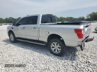 2016 Nissan Titan XD Platinum Reserve with VIN 1N6BA1F45GN514023, listed as a Copart auction lot 68817774 with 207,822 mi miles and Salvage Title. Bid and sale history available at carsss.com. Image 2.