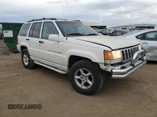 1998 Jeep Grand Cherokee Limited with VIN 1J4GZ88Z4WC164505, listed as a Copart auction lot 76843304 with 0 mi miles and Salvage Title. Bid and sale history available at carsss.com. Image 4.