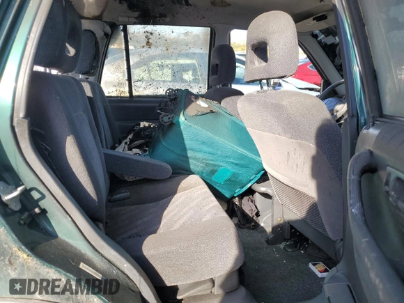 1999 Honda CR-V EX with VIN JHLRD1869XC018910, listed as a Copart auction lot 77180854 with 155,075 mi miles and Salvage Title. Bid and sale history available at carsss.com. Image 11.