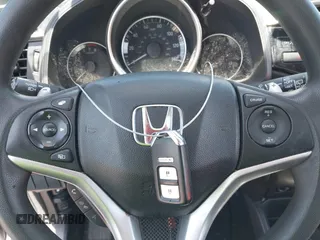 2015 Honda Fit EX-L with VIN 3HGGK5H88FM729435, listed as a IAAI auction lot 41998376 with 130,723 mi miles. Bid and sale history available at carsss.com. Image 11.