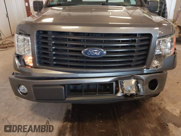 2014 Ford F-150 XL with VIN 1FTMF1CF7EFC67887, listed as a IAAI auction lot 41961500 with 83,934 mi miles and . Bid and sale history available at DreamBid. Image 6.