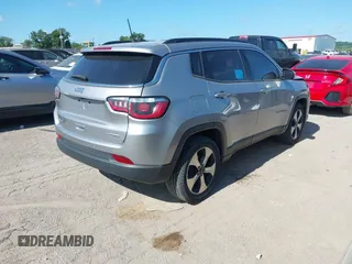 2017 Jeep Compass Latitude with VIN 3C4NJDBBXHT656407, listed as a IAAI auction lot 42562826 with 78,057 mi miles and . Bid and sale history available at DreamBid. Image 4.