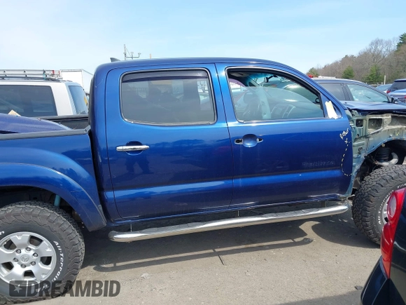 2014 Toyota Tacoma with VIN 3TMLU4EN0EM153558, listed as a IAAI auction lot 41964890 with 140,864 mi miles and . Bid and sale history available at DreamBid. Image 14.