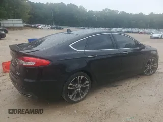 2019 Ford Fusion Titanium with VIN 3FA6P0K9XKR217324, listed as a Copart auction lot 56104185 with 135,728 mi miles and Salvage title. Bid and sale history available at DreamBid. Image 3.