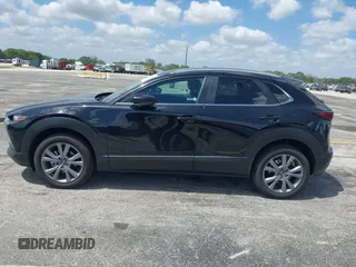2025 Mazda CX-30 S Preferred with VIN 3MVDMBCM0SM798708, listed as a IAAI auction lot 42133091 with 4,305 mi miles and . Bid and sale history available at DreamBid. Image 14.