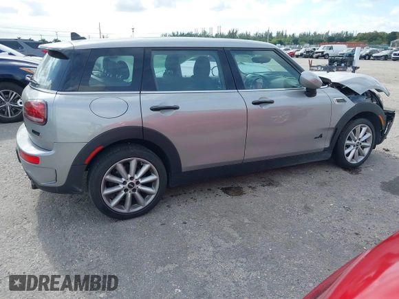2023 MINI Clubman Cooper S with VIN WMWXJ1C03P2U08484, listed as a IAAI auction lot 41056651 with 12,948 mi miles. Bid and sale history available at carsss.com. Image 4.