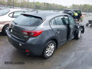 2014 Mazda 3 i Touring with VIN JM1BM1L76E1184728, listed as a IAAI auction lot 41962258 with 200,544 mi miles and . Bid and sale history available at DreamBid. Image 4.