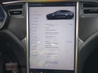 2016 Tesla Model X 70D with VIN 5YJXCAE27GF015175, listed as a IAAI auction lot 41074929 with 115,130 mi miles. Bid and sale history available at carsss.com. Image 7.