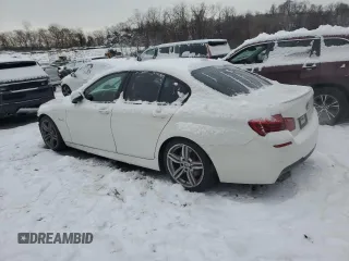 2015 BMW 5 Series 550i with VIN WBAKN9C55FD960970, listed as a Copart auction lot 84994434 with 105,593 mi miles and Salvage title. Bid and sale history available at DreamBid. Image 2.