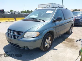 2005 Dodge Caravan SXT with VIN 2D4GP44L95R565529, listed as a IAAI auction lot 42460426 with 97,882 mi miles and . Bid and sale history available at DreamBid. Image 2.