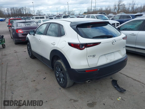 2023 Mazda CX-30 S z VIN 3MVDMBAM6PM572425, wystawiony jako IAAI lot #41833170 z przebiegiem 18 307 mil mil oraz . Historia ofert i sprzedaży dostępna na DreamBid. Obrazek 3.