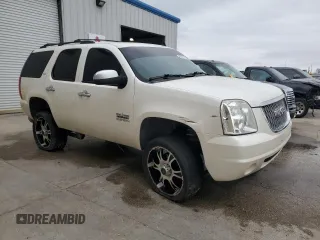 2010 GMC Yukon SLT with VIN 1GKUCCE01AR287921, listed as a Copart auction lot 50781775 with 202,301 mi miles and Salvage Title. Bid and sale history available at carsss.com. Image 4.