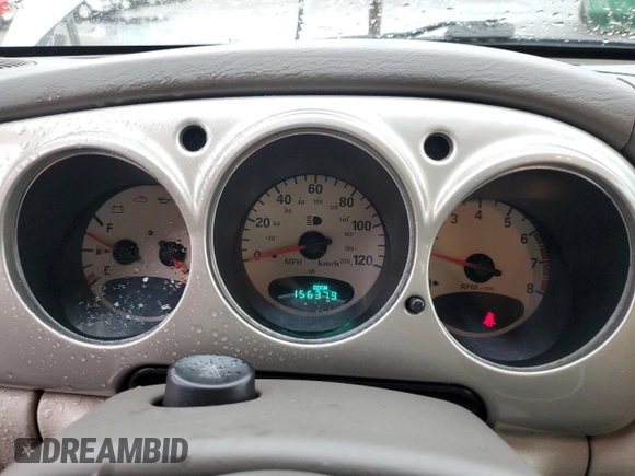 2002 Chrysler PT Cruiser Touring z VIN 3C4FY58B32T288205, wystawiony jako Copart lot #61591295 z przebiegiem 156 379 mil mil oraz Szkoda całkowita • Salvage title. Historia ofert i sprzedaży dostępna na DreamBid. Obrazek 9.