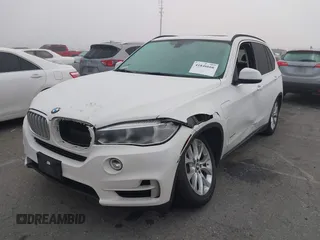 2016 BMW X5 xDrive40e with VIN 5UXKT0C59G0S79593, listed as a IAAI auction lot 41846666 with 57,178 mi miles and . Bid and sale history available at DreamBid. Image 17.