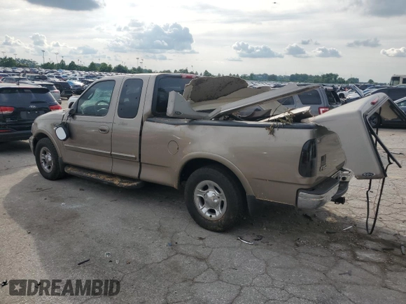 2002 Ford F-150 XL with VIN 1FTRX17L02KC02580, listed as a Copart auction lot 60859595 with 175,892 mi miles and Salvage title. Bid and sale history available at DreamBid. Image 2.
