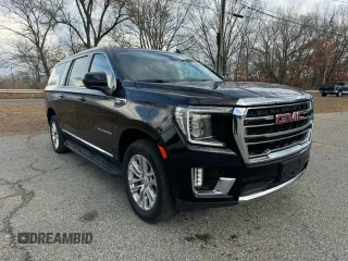 2021 GMC Yukon XL SLT with VIN 1GKS2GKDXMR238116, listed as a Copart auction lot 83266714 with 106,975 mi miles and Clean Title. Bid and sale history available at carsss.com. Image 1.