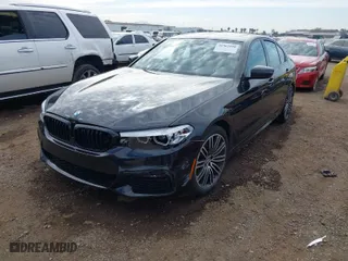 2019 BMW 5 Series 530e iPerformance with VIN WBAJA9C59KB389304, listed as a IAAI auction lot 41562928 with 64,137 mi miles. Bid and sale history available at carsss.com. Image 2.