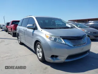 2014 Toyota Sienna LE AAS with VIN 5TDKK3DC4ES447265, listed as a IAAI auction lot 42024631 with 112,890 mi miles. Bid and sale history available at carsss.com. Image 1.
